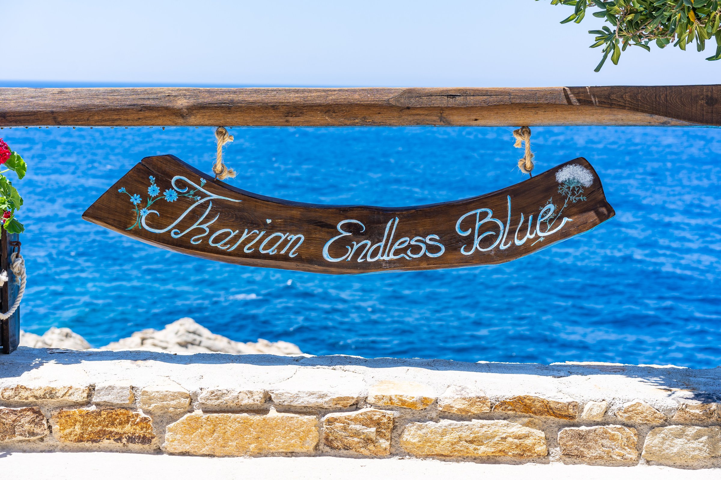 Ikarian Endless Blue handcrafted sign overlooking the Aegean
