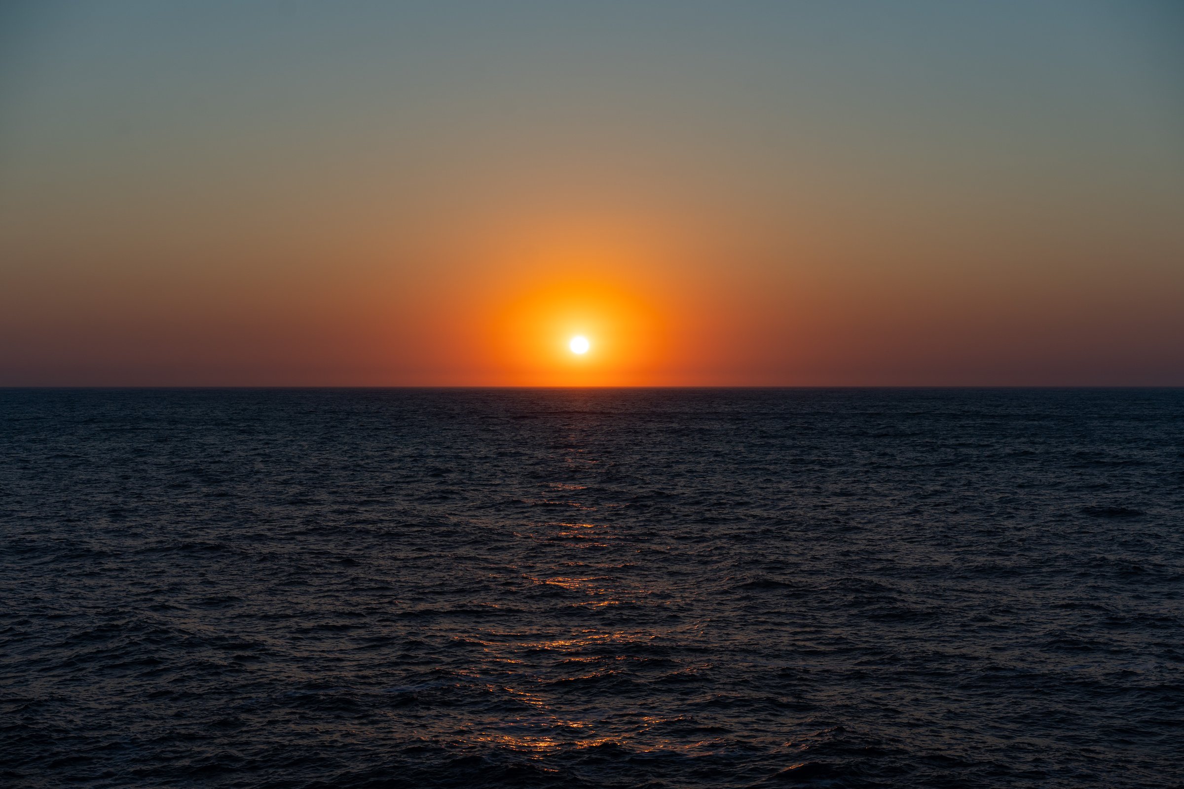 Sunset over the Aegean, where myths of Icarus and Dionysus are born