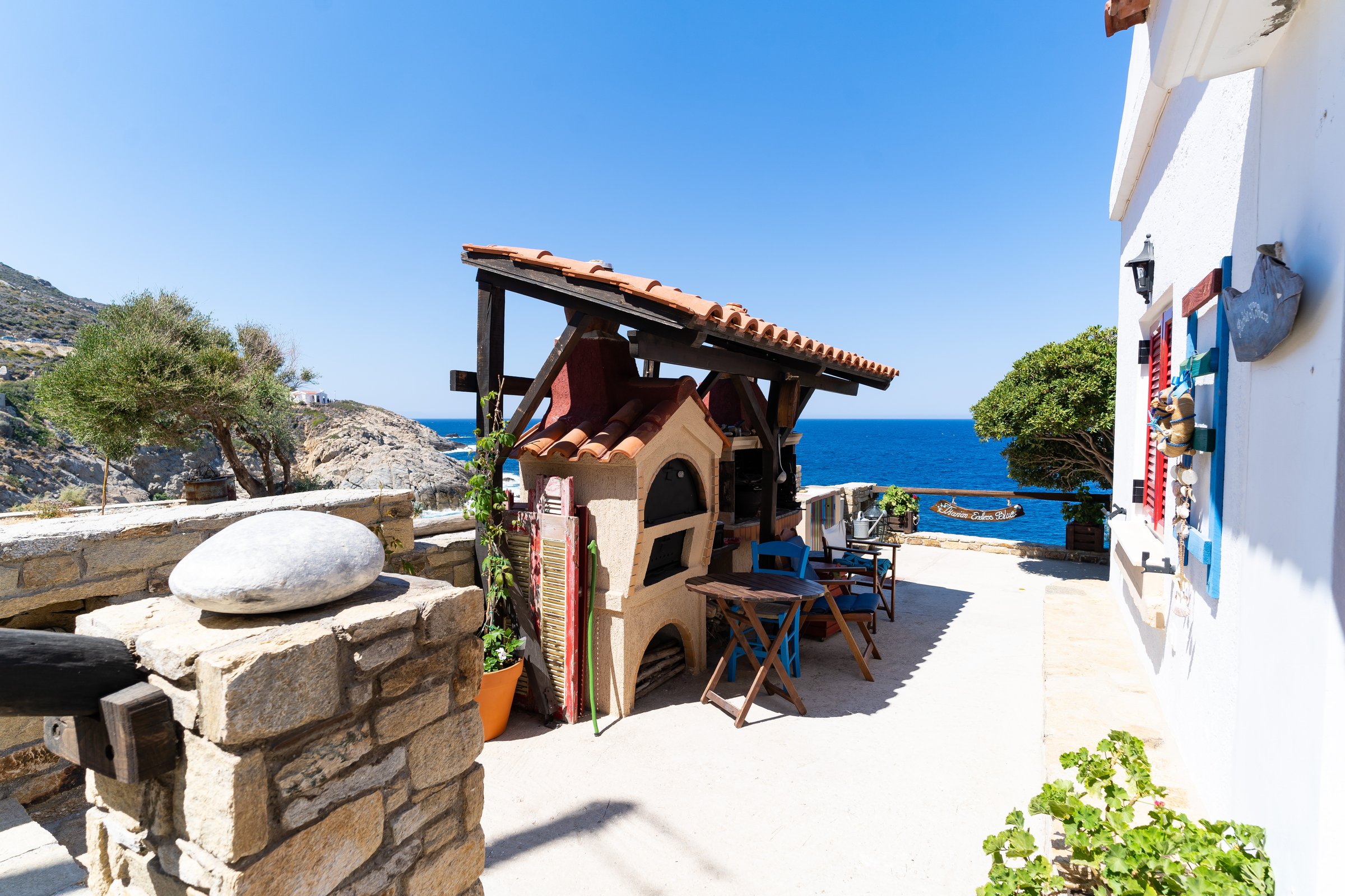 Traditional wood oven and BBQ on the seafront terrace